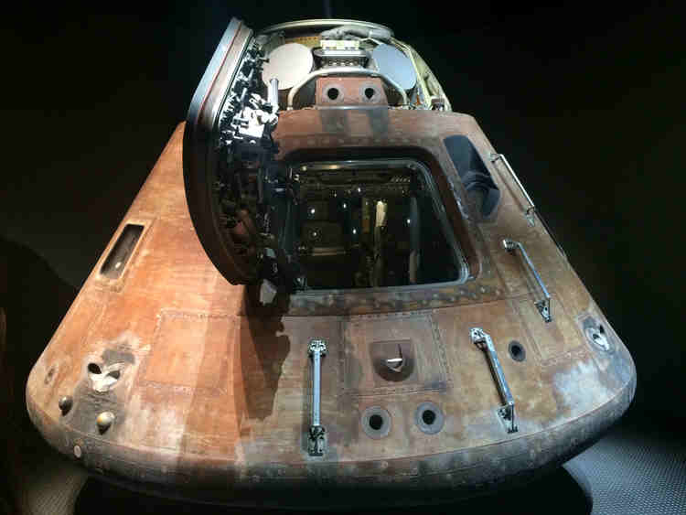 The Apollo 13 module after its safe return - the brown exterior is due to the metal being burnt on re-entry to Earth.